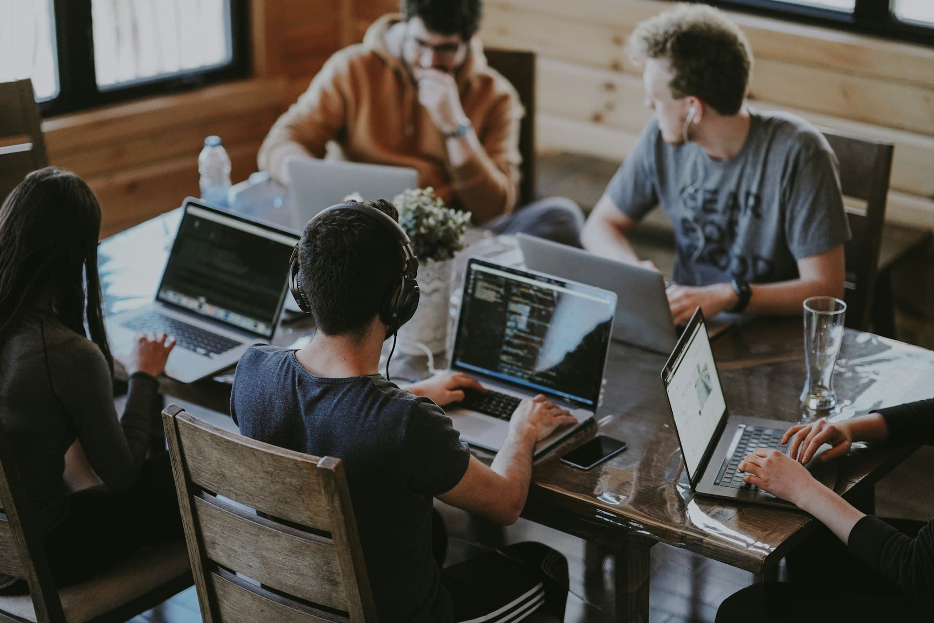 Corporate team collaborating in modern office